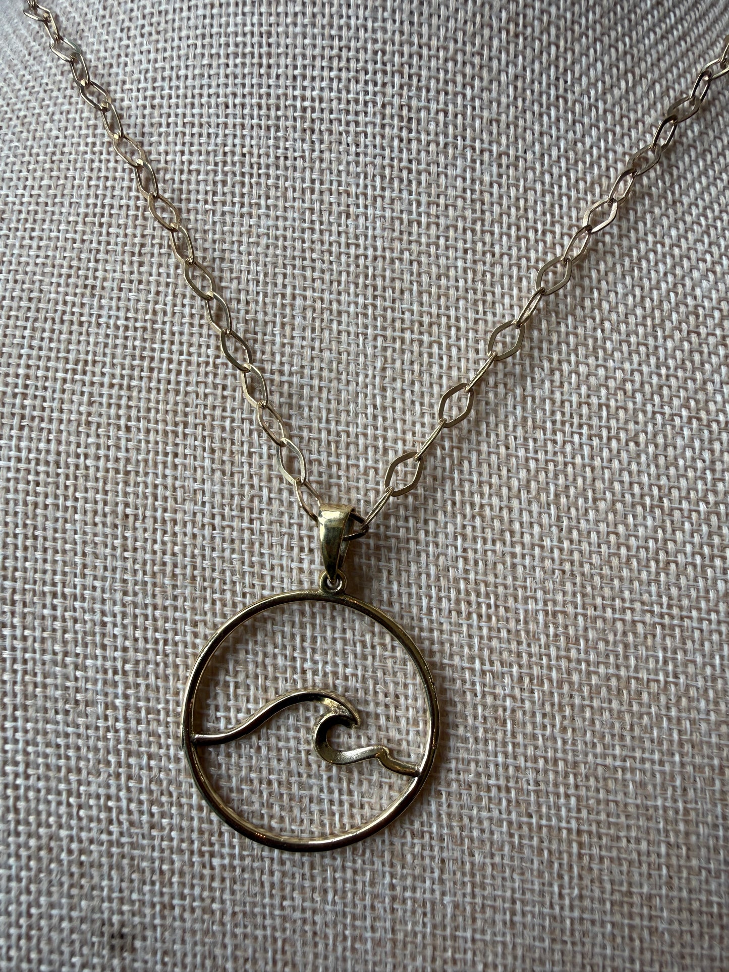 Brass Waves in Circle Pendant Necklace